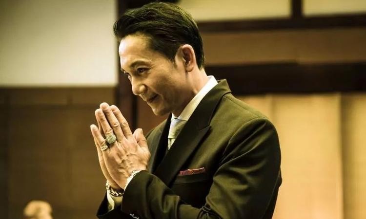 竹联帮现任帮主的照片（竹联帮猴王胡台富）