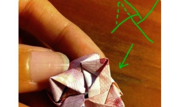 如何折玫瑰花，如何用百元大钞折玫瑰花？图51