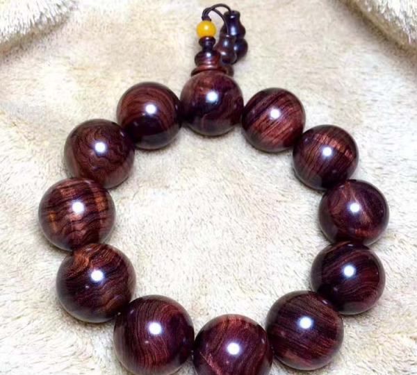 紫油梨鉴定方法,海南紫油梨专家帮我看看这两串是真得吗?图2