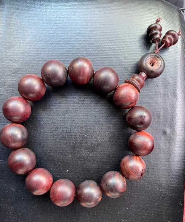 紫油梨鉴定方法,海南紫油梨专家帮我看看这两串是真得吗?图1