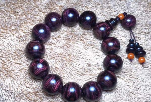 紫油梨鉴定方法,海南紫油梨专家帮我看看这两串是真得吗?图16