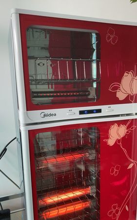 消毒柜灯管发红光是怎么回事啊