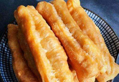 油条为什么要两根并在一起炸,油条为什么非要2根一起炸才好吃图5