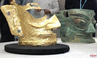 ​三星堆再出土金面具，上面为什么有耳洞？